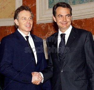 PMs Blair & Zapatero shake hands, gingerly